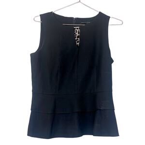 White House black market  black sleeveless blouse size 2 peplum